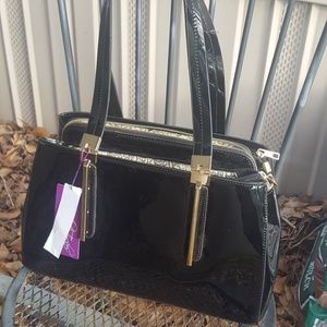 Carolyn Tucker black faux patent leather handbag